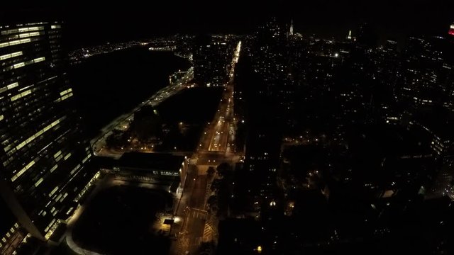 Night time lapse of the Midtown Manhattan, First Avenue, FDR Drive and East River in New York City, USA.