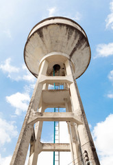 Water tank Old , water supply tank for agriculture with blue sky background(Panorama)