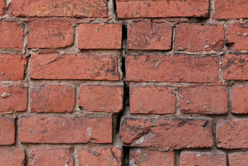 The crack in the brick wall.