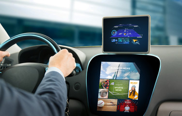 close up of man with gps on tablet pc driving car