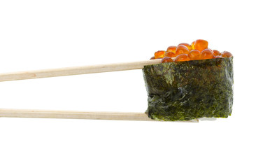 Sushi gunkan in chopsticks isolated on white background