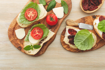 Sandwiches with mascarpone, dried tomatoes, basil