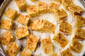 Fancy cakes with slices of peanuts