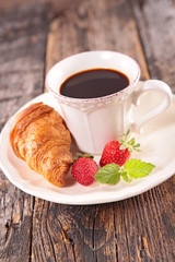 coffee cup and croissant