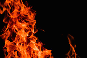 raging flames red fire black background