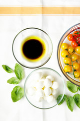 ingredients on white. Cherry tomatoes: red and yellow. little mo