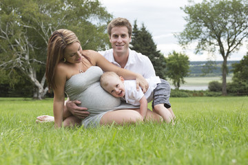 Fototapeta premium Family together in the summer park with a son