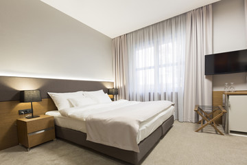 Fototapeta premium Interior of a new modern hotel bedroom