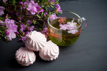 Zephyr on the black wooden background