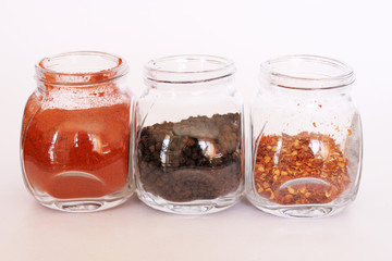 Three Opened Glass Jars with Spices