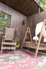 antique wooden chair and cradle