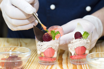 cook prepares canapes in the kitchen at the restaurant