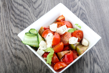 Salad with mozzarella, tomato and cucumber