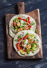 Chicken meatballs and fresh vegetables tacos. Healthy delicious breakfast or snack. On wooden rustic board