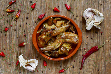 conejo al ajillo, a typical spanish recipe of rabbit