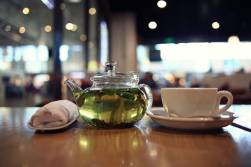 green tea in a teapot - obrazy, fototapety, plakaty