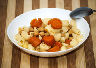 Vegetable soup with pasta, carrots and chickpeas
