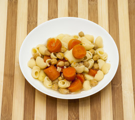 Vegetable soup with pasta, carrots and chickpeas