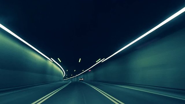 Car Dash Camera Time Lapse at Night in a Tunnel on the Highway in Montreal City