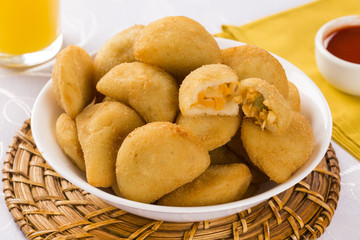 Rissole - Palmetto rissole served with chili sauce on the table.