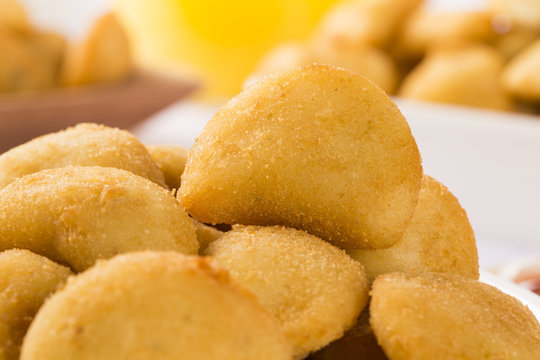 Rissole - Cheese rissole served with chili sauce on the table.