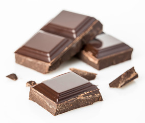 Chocolate bars isolated on white background. Selective focus.