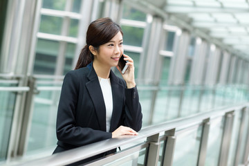 Asian Businesswoman chat on mobile phone