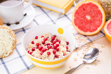 Breakfast: oatmeal with cowberry. Bread and butter, coffee, grapefruit; yellow book for notes and plans for the day