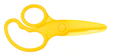 Yellow fully plastic safe toy scissors isolated over white