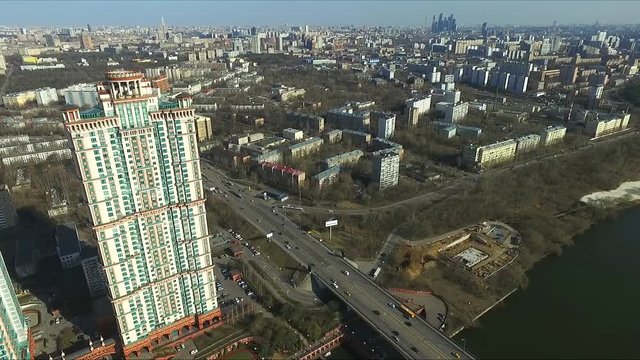 Aerial view of Moscow. Skyscraper of residential complex Alye Parusa over Moskva River. Moscow, Russia.