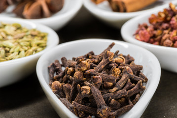 Cloves in White Spoon