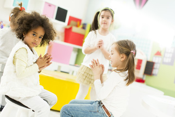 Little girls in the kindergarten