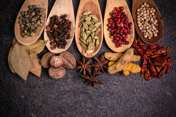 spices and herbs on wooden table , medicinal concept