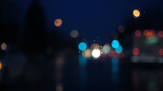 Slow Motion Rainy Dark Night view of the Wipers Motion From Inside a Car