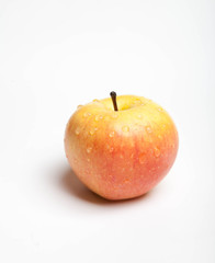 apple with drops on white background