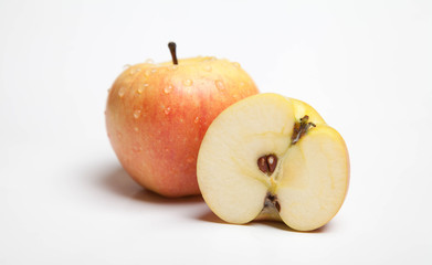 half an apple on a white background