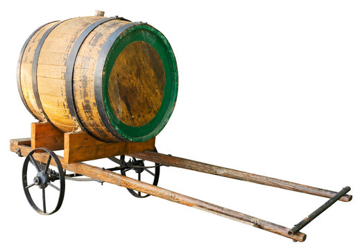 Wooden barrel on cart isolated. Clipping path included.