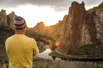 Caucasian man admiring scenic desert landscape, Smith Rock State Park, Oregon, United States