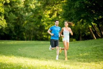 Wall murals Jogging Young couple running