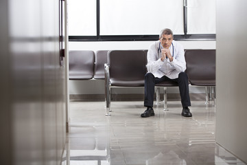 Doctor taking a quiet moment alone