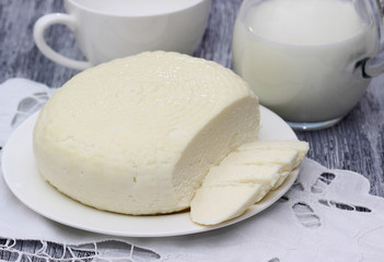 Dairy products on wooden table.