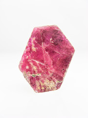 Natural  flat red Ruby corundum crystal showing the hexagonal shape on white. July Birthstone and...