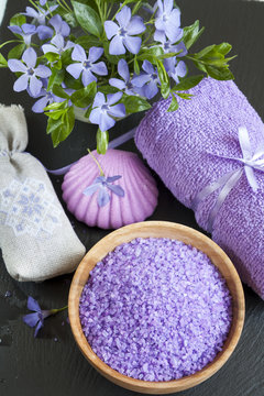Lavender bath salts with flowers, soap, sachet and towel