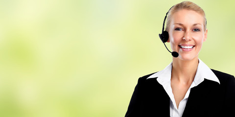 Smiling agent woman with headsets.
