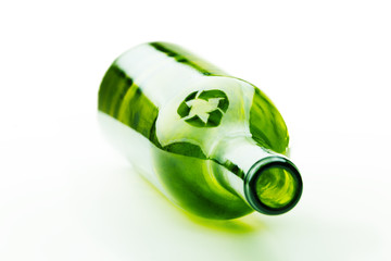 Empty wine bottle with recycle sign
