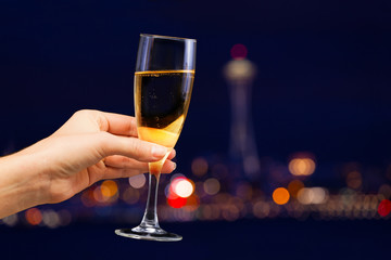 Picture of woman hand holding champagne glass