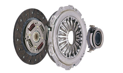 A new set of replacement automotive clutch on a white background. 