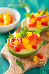 avocados stuffed with tomato pepper salad