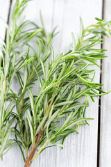 rosemary on wooden surface