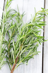 Obraz premium rosemary on wooden surface